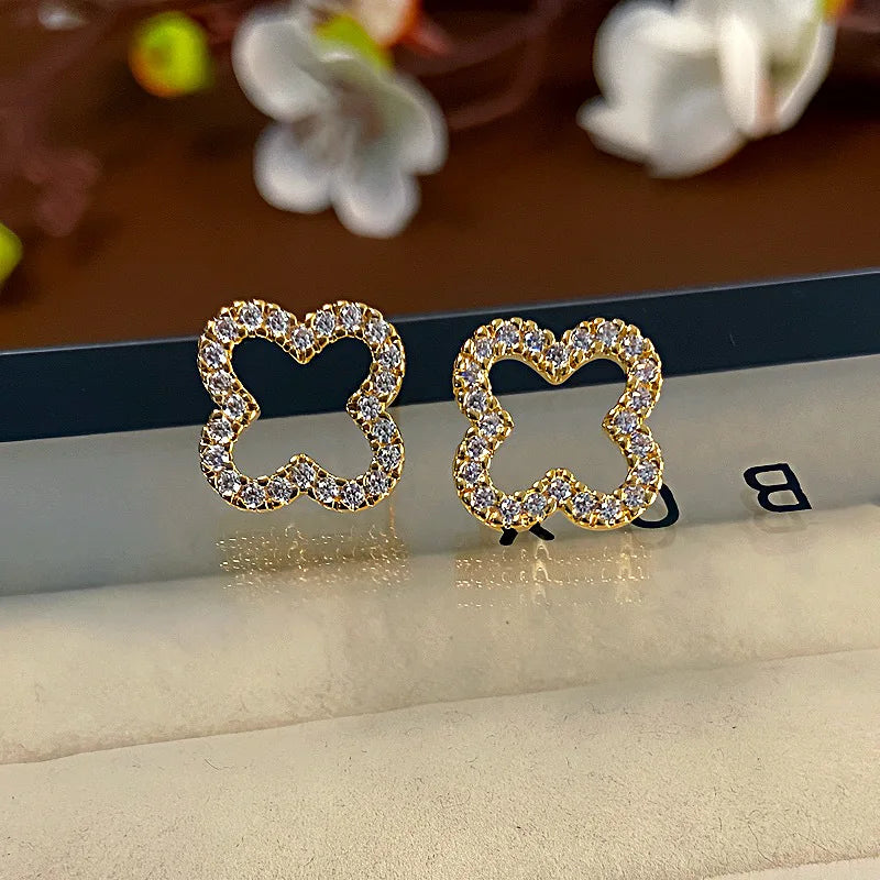 Boucles d'oreilles trèfle à quatre feuilles creuses simples pour femmes, bijoux tendance