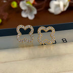 Boucles d'oreilles trèfle à quatre feuilles creuses simples pour femmes, bijoux tendance